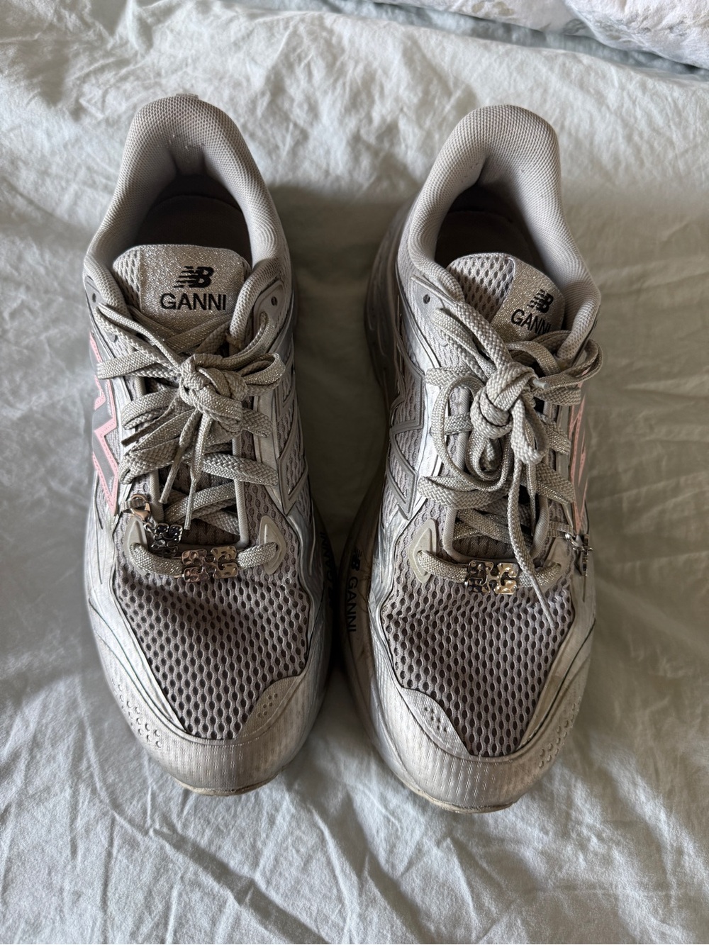 New Balance Women's Sneakers in Light Gray with Pink Accents